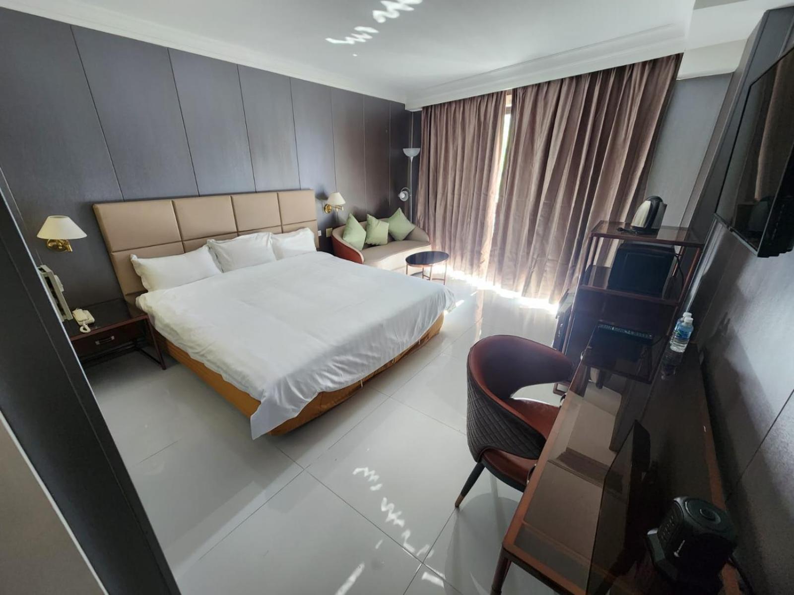 โรงแรมรอยัลออร์คิดกวม ตามูนิง ภายนอก รูปภาพ